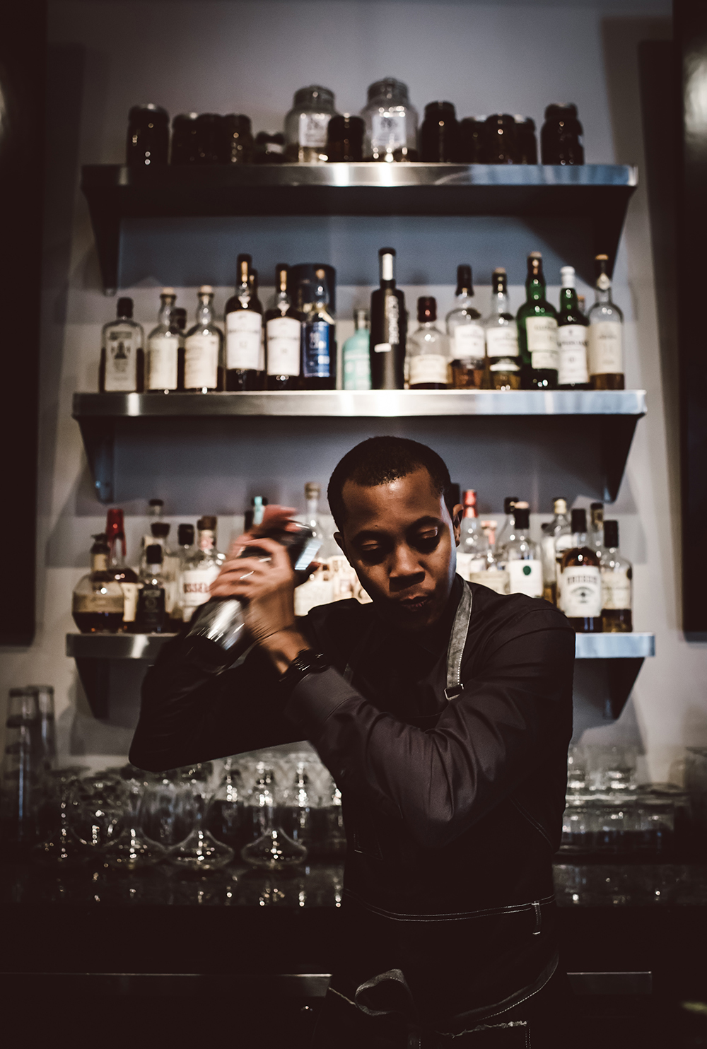 mixologist making a drink