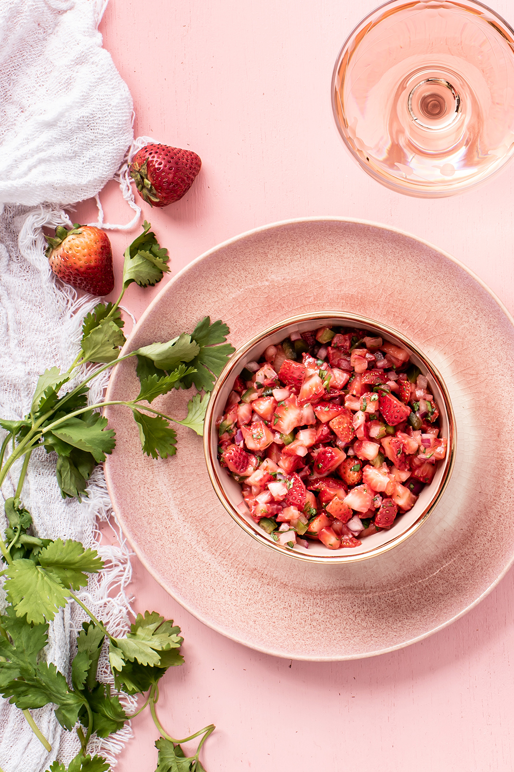 Strawberry salsa on a pink surface