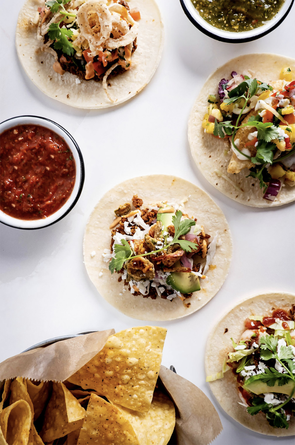 tacos on a white table