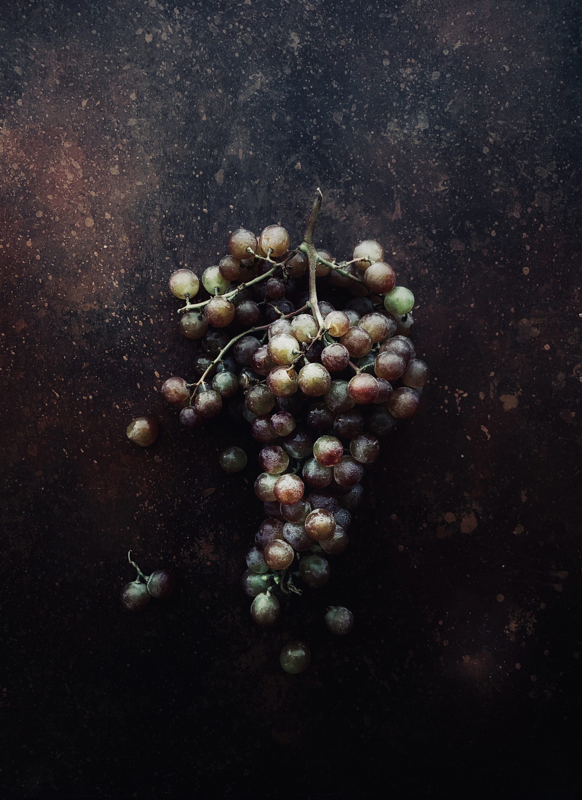 grapes on a dark surface